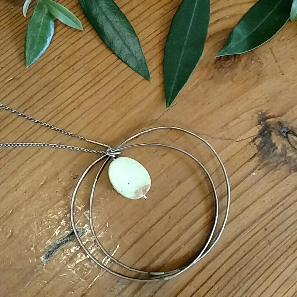 Very light yellow-green hoop necklace